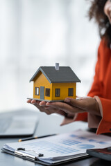 African American realtor working at desk, Housing estate, Vacancy, Prime location, Description of project, Infrastructure, Agency Agreement, Appraisal Price, Electricity Meter and Deposit, Low Rise