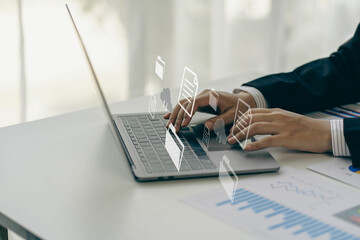 Close up of businesswoman hand holding pen and pointing at financial document Financial charts to...