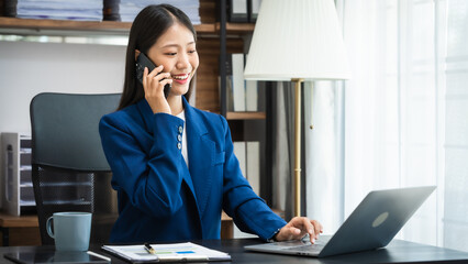 Young chinese business woman doing bookkeeping analyst audit working papers, public offering, cash...