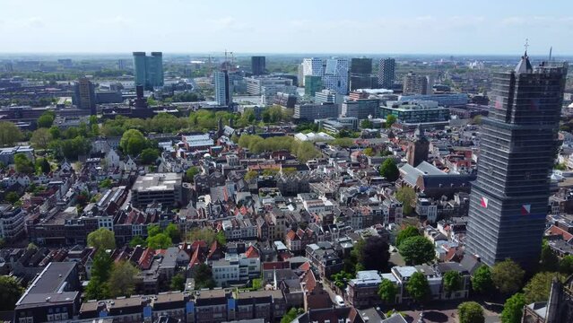 St Martins cathedral with restoration scaffolding aerial view dolly across Utrecht city skyline