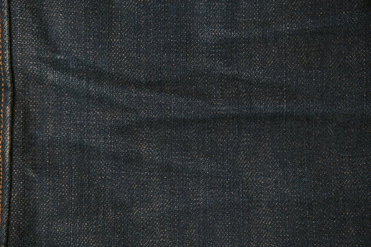 blue jeans denim texture closeup dark indigo