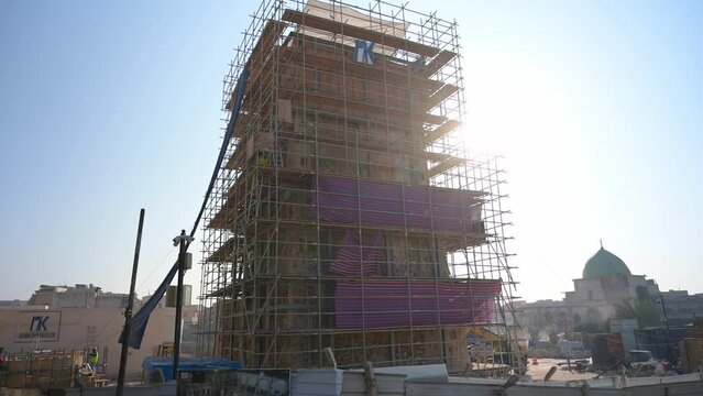 Scaffolding for reconstruction of leaning minaret of Great Mosque of al-Nuri, Mosul in Iraq. Low angle sideways