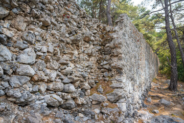 Ancient wall in Cleopatra Bath Bay near Fethie in Turkey