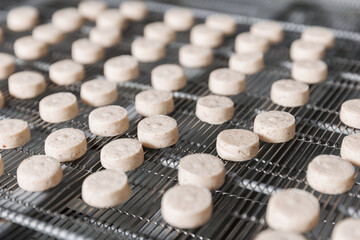 Sweets candy move on industry conveyor. Chocolate production factory