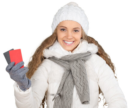 Portrait of beautiful young woman in winter clothes with gift cards