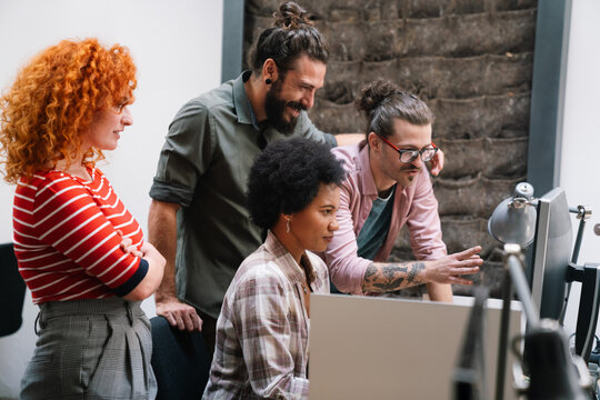 Collaboration and analysis by business people working in office