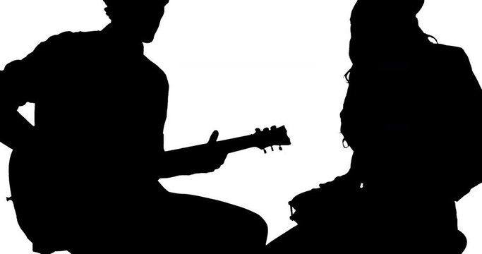 Animation of black silhouette of men playing guitar and drums on white background