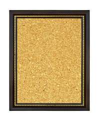 Fototapeta premium Wooden and gold gilded ornamental frame with rectangular cork board