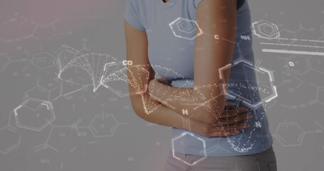 Animation of dna strand with data processing over midsection of biracial woman holding belly - Powered by Adobe