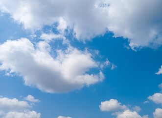 fluffy white clouds on a clear blue sky. cloud sky in summer. the concept of heaven sky.nature background .focus on cloud