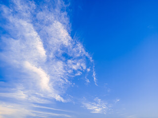 Soft white cloud background with bright blue sky in the morning. Focus on clouds