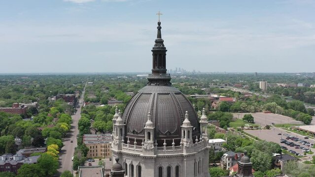 Aerial close-up parallax panning shot around the dome of the Cathedral of Saint Paul in Minnesota. 4K