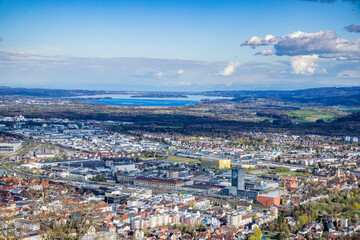 Fototapeta premium Bird's-eye view of the city of Singen against the backdrop of the Lake Constance
