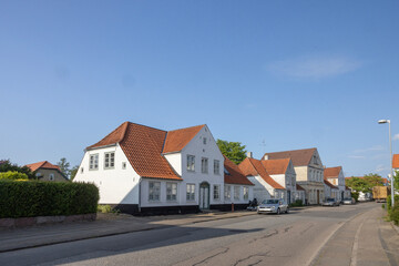 Happy walking in the streets of Augustenborg, village of Augustenborg on Als in the municipality of Sønderborg in Denmark.
