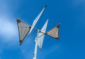 decorative poles moving with the wind at the port of Genoa