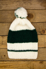 Handmade wool knitted winter green and white hat