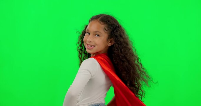 Girl child, hero and green screen with face, smile and justice with hands on hips for mock up. Happy female kid, power and portrait for confidence, red superhero cape and stop crime with hair in wind