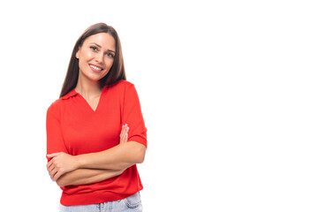 young smiling pretty caucasian brunette in a red short sleeve shirt on a white background with copy...