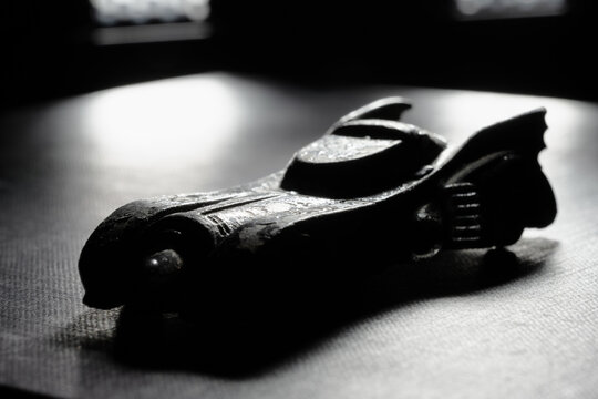 M&ouml;lndal, Sweden - March 23 2023: Worn vintage Batmobile toy metal car.
