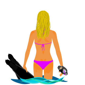 Girl in bikini on the beach with scuba fins and mask