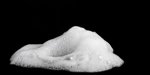 liquid white foam from soap or shampoo or shower gel Abstract soap bubbles. Set foam, soap bubble isolated on black, with clipping path texture and background.	
