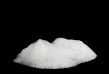 liquid white foam from soap or shampoo or shower gel Abstract soap bubbles. Set foam, soap bubble isolated on black, with clipping path texture and background.	
