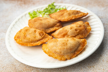empanadas pie beef meat stuffed food snack on the table copy space food background rustic top view