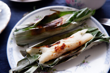Otak-otak is a Southeast Asian fish cake made of ground fish mixed with spices and wrapped in leaf parcels. Otak-otak is traditionally served steamed or grilled