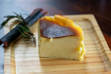person slicing a piece of cake