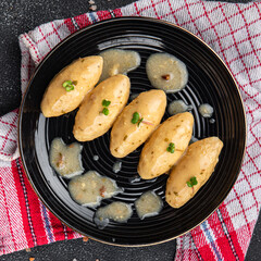 quenelles mushroom sauce meal food snack on the table copy space food background rustic top view