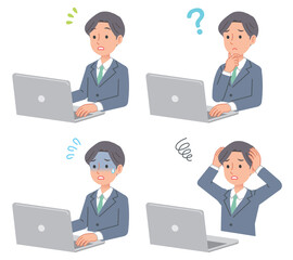 パソコンを操作する男性ビジネスパーソン