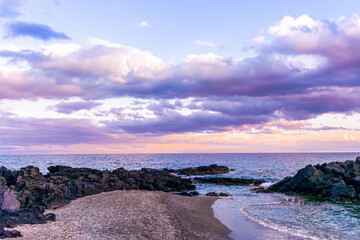 amazing evening or morning sea shore landscape of blue water, rock coast and unique natural...