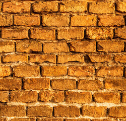 breautiful colorful old brick wall background for wallpaper and design concept, vintage wall with yellow and brown , old texture of vintage building backdrop