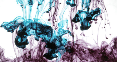 Movement of liquid black ink drops of blue and red