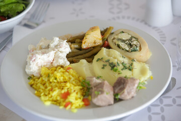 Concept of balanced healthy diet - rice, cheese, vegetable and meat on the plate