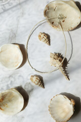 decorative stand with necklace and shells