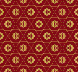 Arabic decorative pattern in red and gold color. Hexagonal geometric tile design.
