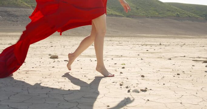 Close up of barefoot woman model epic walk on fashion show Concept of light mood