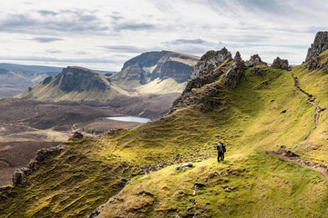Beautiful panorama view of Quiraing with people, Scotland, Isle of Skye