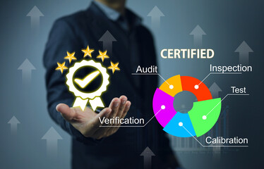 Business man is holding to work  ISO standard cerfified, the accreditation work system for testing...