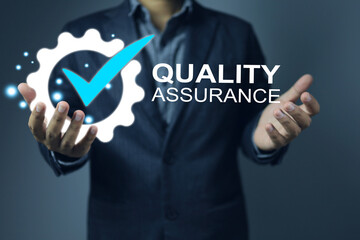 Officers or auditors hold quality marks certification ready to be presented to factory...