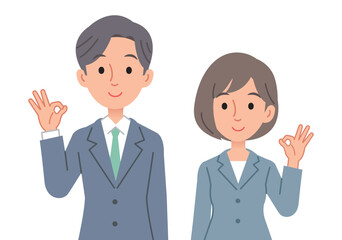 笑顔でOKサインをするビジネスパーソン（男女）