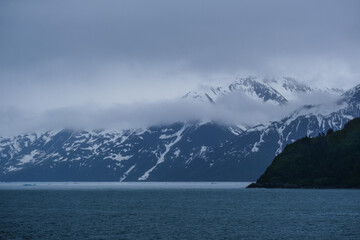 Cruise to Hubbard Glacier Bay in Alaska with floating ice bergs and drift ice floes on ocean water...