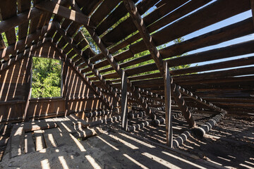 Abstract grunge wooden interior with striped pattern of sunbeams