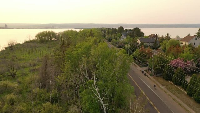 Aerial view of Minnesota Point, neighborhood of Duluth, Minnesota, United States. Park Point separates Lake Superior from Superior Bay and the Duluth Harbor Basin. Spring Summer, sunset