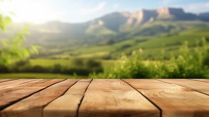 Empty wooden tabletop close-up against the backdrop of a mountain range.