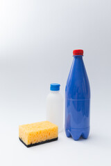 blue plastic bottle with sponge