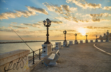 Bari seafront. Colorful amazing sunset. Coastline and city view.