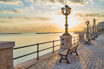Bari seafront. Colorful amazing sunset. Coastline and city view. - 615753295