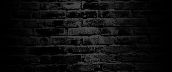 Black brick wall, dark background for design, texture of a perfect black brick wall as background or wallpaper, brick surface backgrounds. black brick wall backgrounds, brick wall light room.
